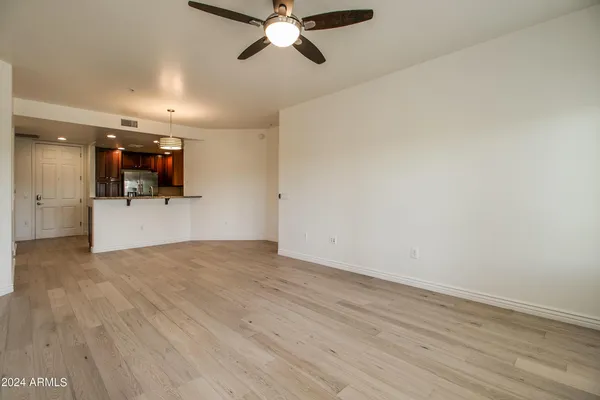 a view of a livingroom and a fireplace
