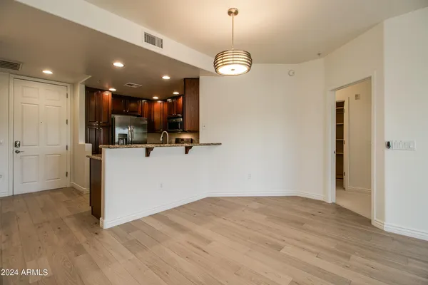 a view of a kitchen and a window