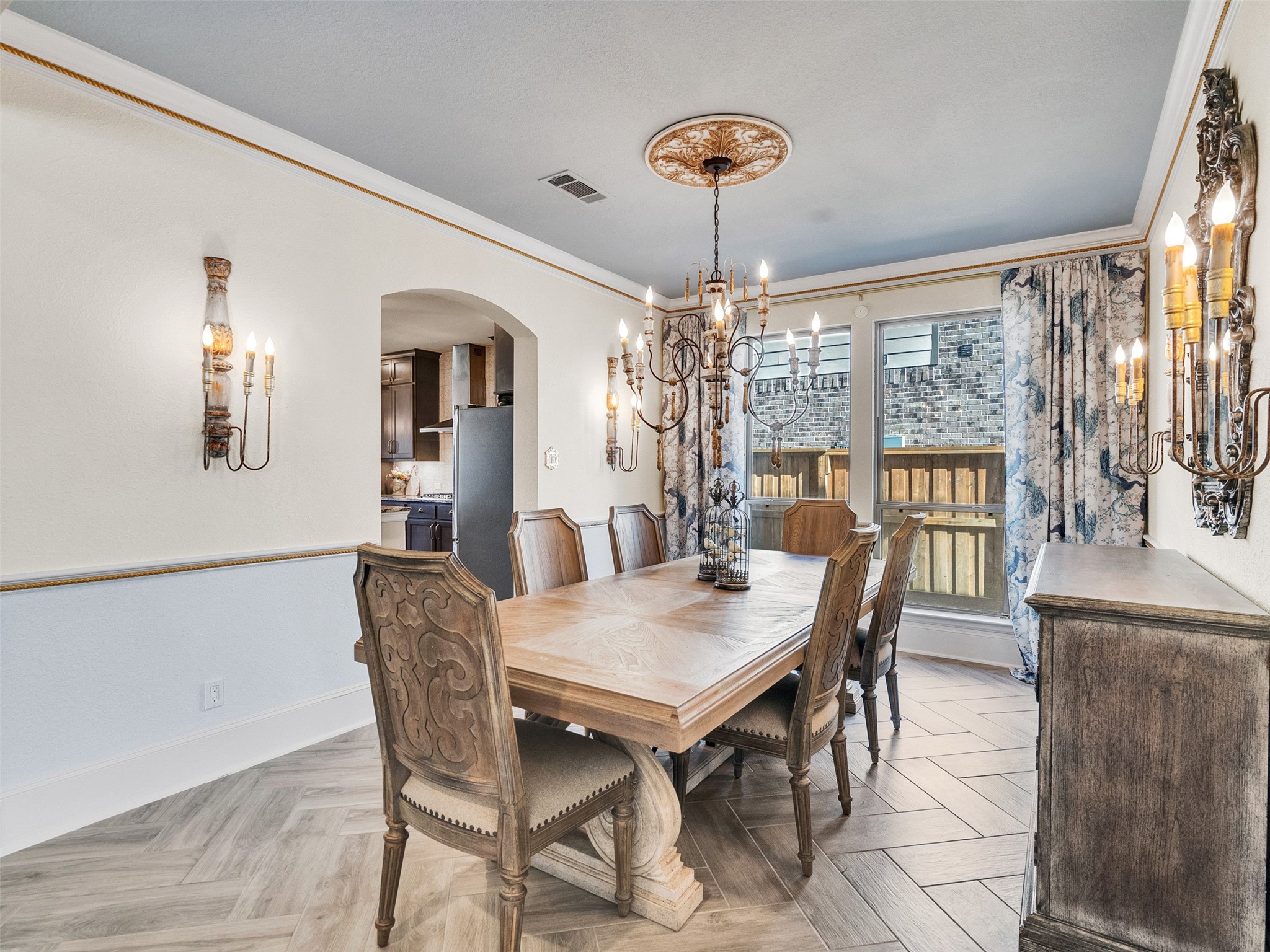 8673 Burdekin Road Magnolia, TX 77354 - Photo 11 of 48 a view of a dining room with furniture window and wooden floor