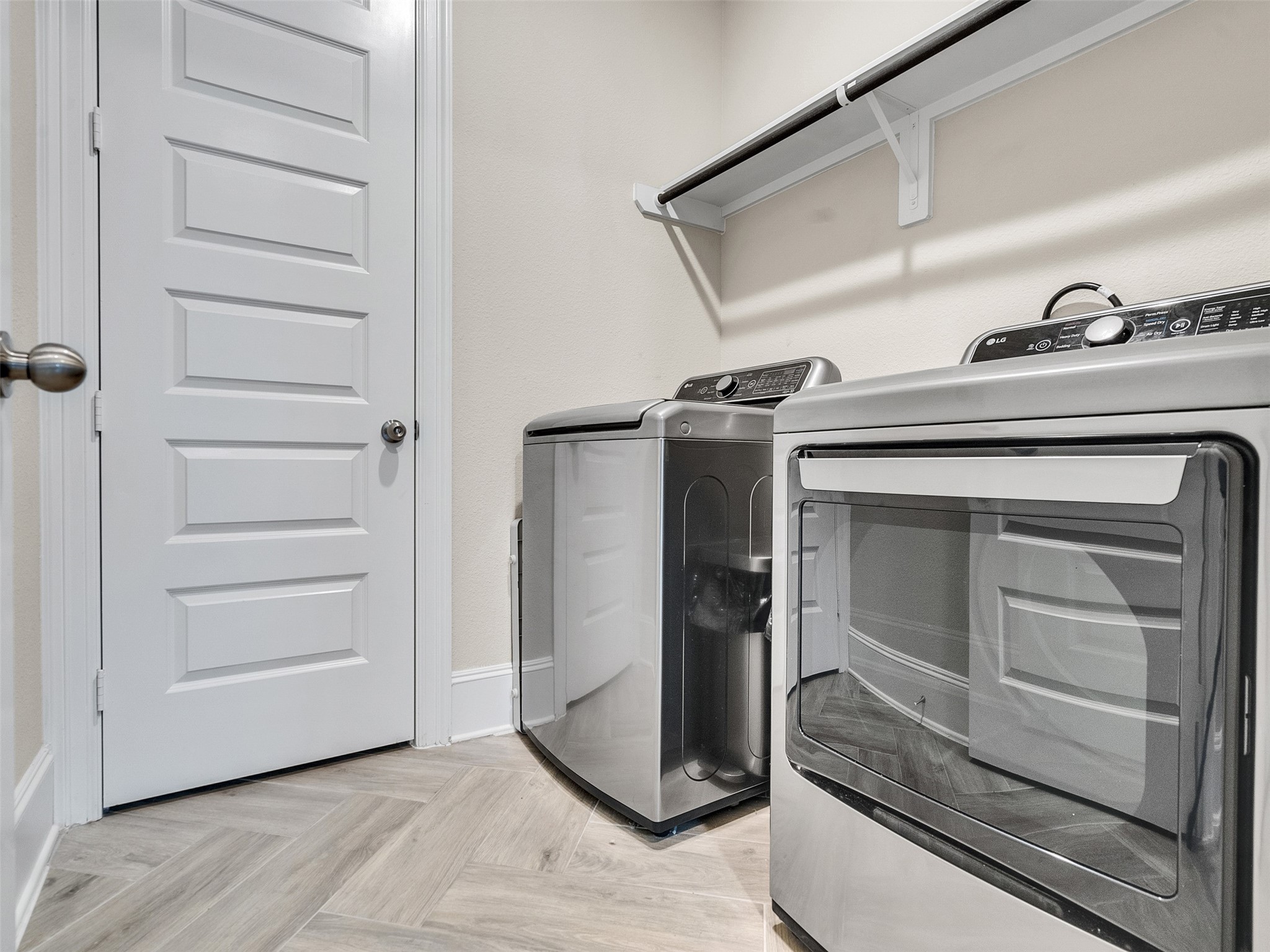 8673 Burdekin Road Magnolia, TX 77354 - Photo 15 of 48 a view of a storage and utility room