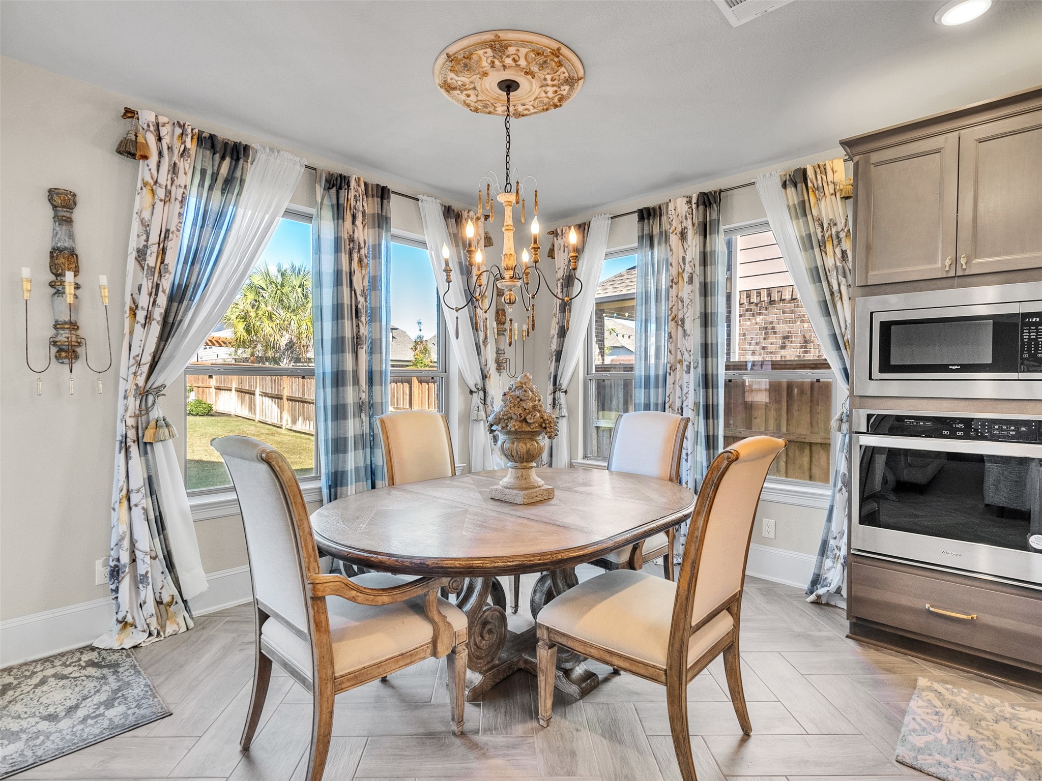 8673 Burdekin Road Magnolia, TX 77354 - Photo 19 of 48 a view of a dining room with furniture window and outside view
