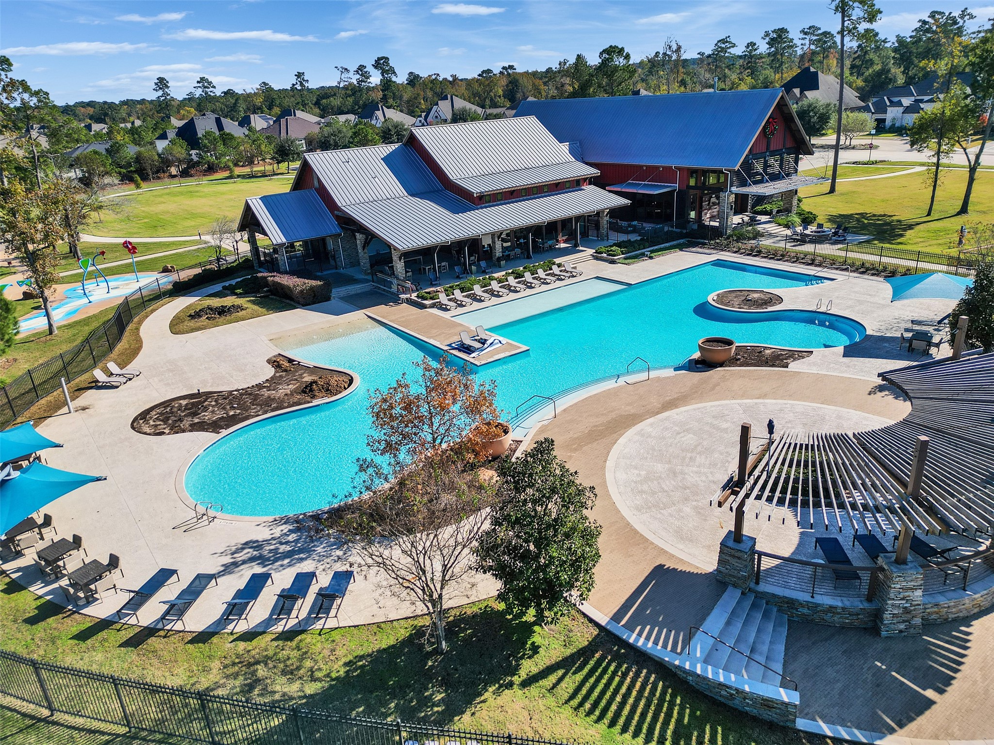 8673 Burdekin Road Magnolia, TX 77354 - Photo 3 of 48 an aerial view of a house with outdoor space