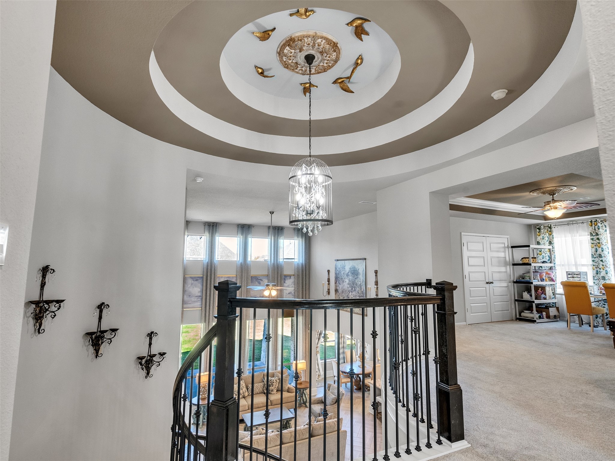 8673 Burdekin Road Magnolia, TX 77354 - Photo 31 of 48 a view of a hallway with a chandelier and livingroom
