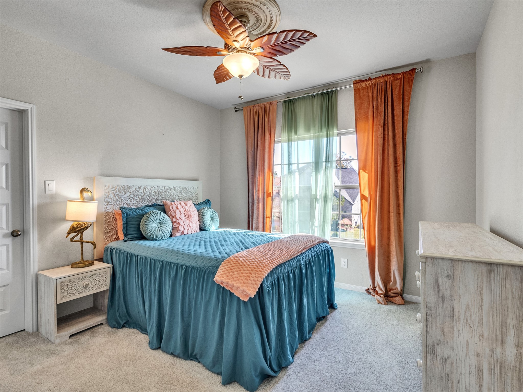 8673 Burdekin Road Magnolia, TX 77354 - Photo 32 of 48 a bedroom with a bed and a large window