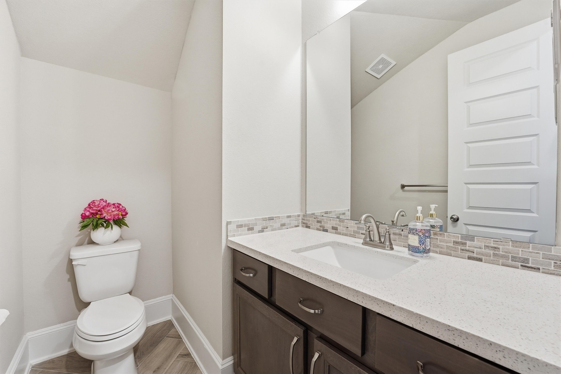 8673 Burdekin Road Magnolia, TX 77354 - Photo 32 of 50 a bathroom with a sink and a toilet