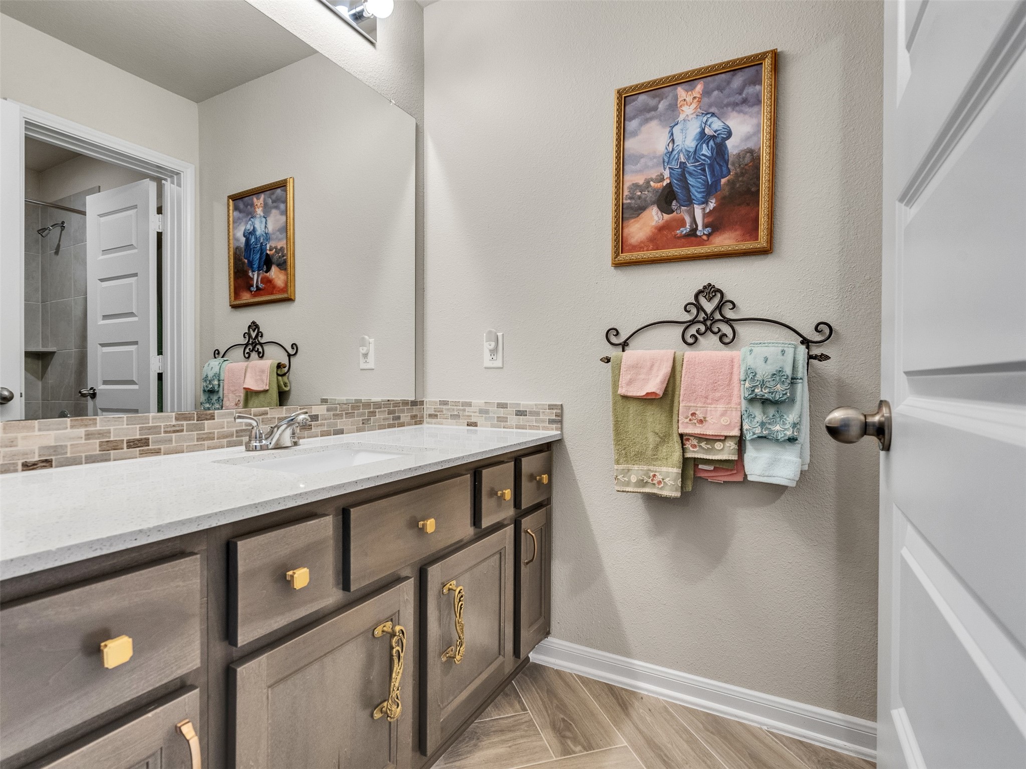 8673 Burdekin Road Magnolia, TX 77354 - Photo 33 of 48 a bathroom with a sink double vanity and a mirror