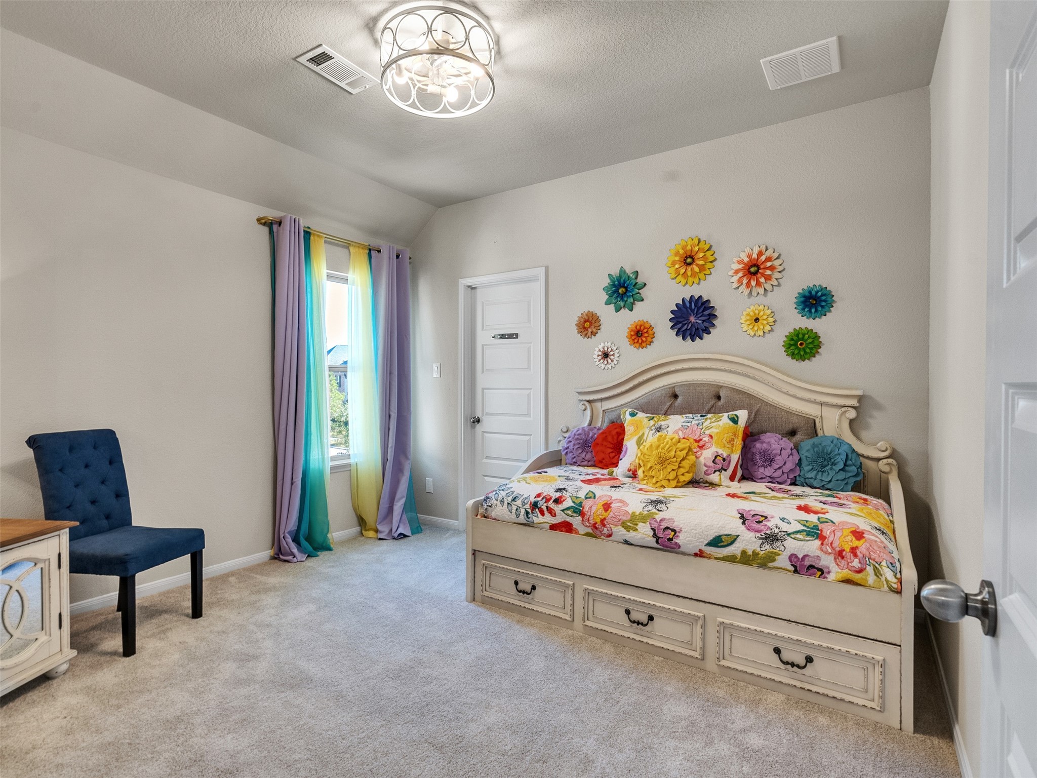 8673 Burdekin Road Magnolia, TX 77354 - Photo 35 of 48 a bedroom with a bed and a table in it