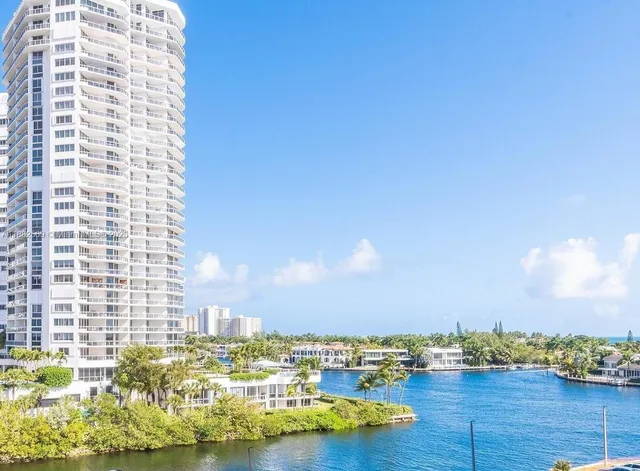 a view of city with ocean