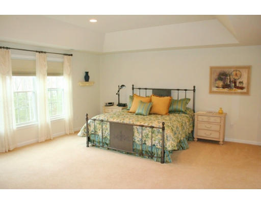 32 Howarth Drive Upton, MA 01568 - Photo 18 of 26 a bedroom with a bed and a window