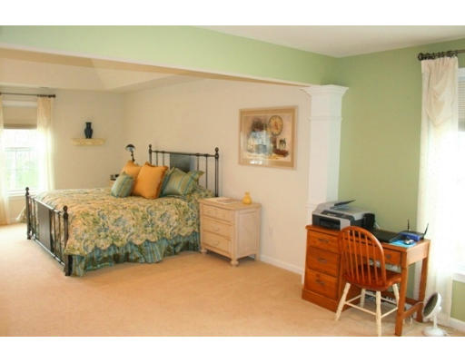 32 Howarth Drive Upton, MA 01568 - Photo 20 of 26 a bedroom with a bed a chair and dresser
