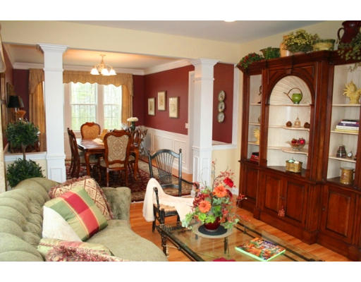 32 Howarth Drive Upton, MA 01568 - Photo 5 of 26 view of living room filled with furniture and floor to ceiling window