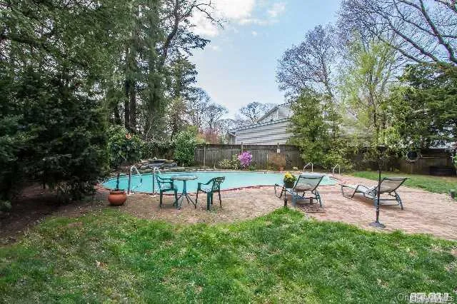 a view of a bench in a garden