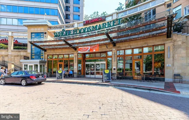 a front view of a building with street view