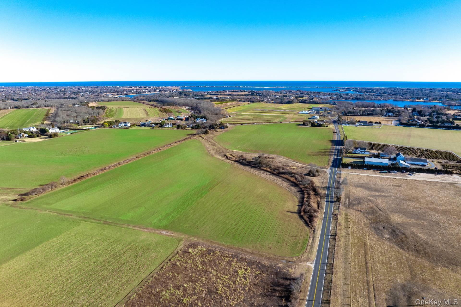 639 Deerfield Road Water Mill, NY 11976 - Photo 1 of 5 an aerial view of a ocean view