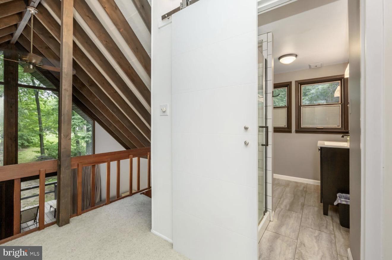5 Falcon Bridge Road Ocean Pines, MD 21811 - Photo 33 of 59 a view of a hallway with wooden floor and entryway
