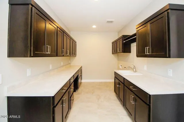 a bathroom with a sink a mirror and a bathtub