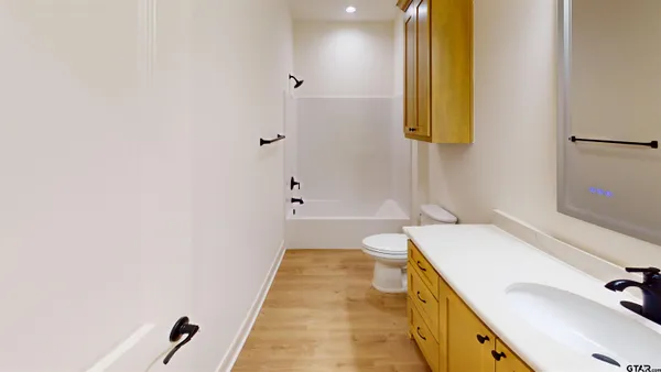 a bathroom with a sink and a bathtub