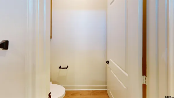 a kitchen with a sink a refrigerator and window