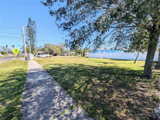 a view of a yard with an outdoor space