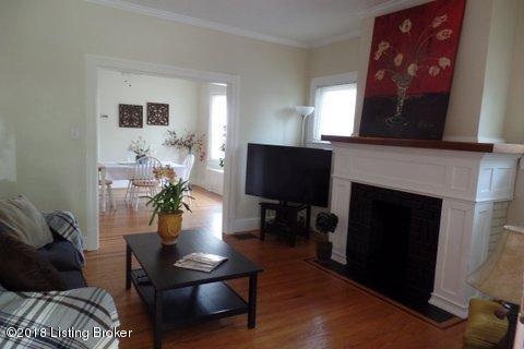 Living room looking into the large Dining room with a window seat