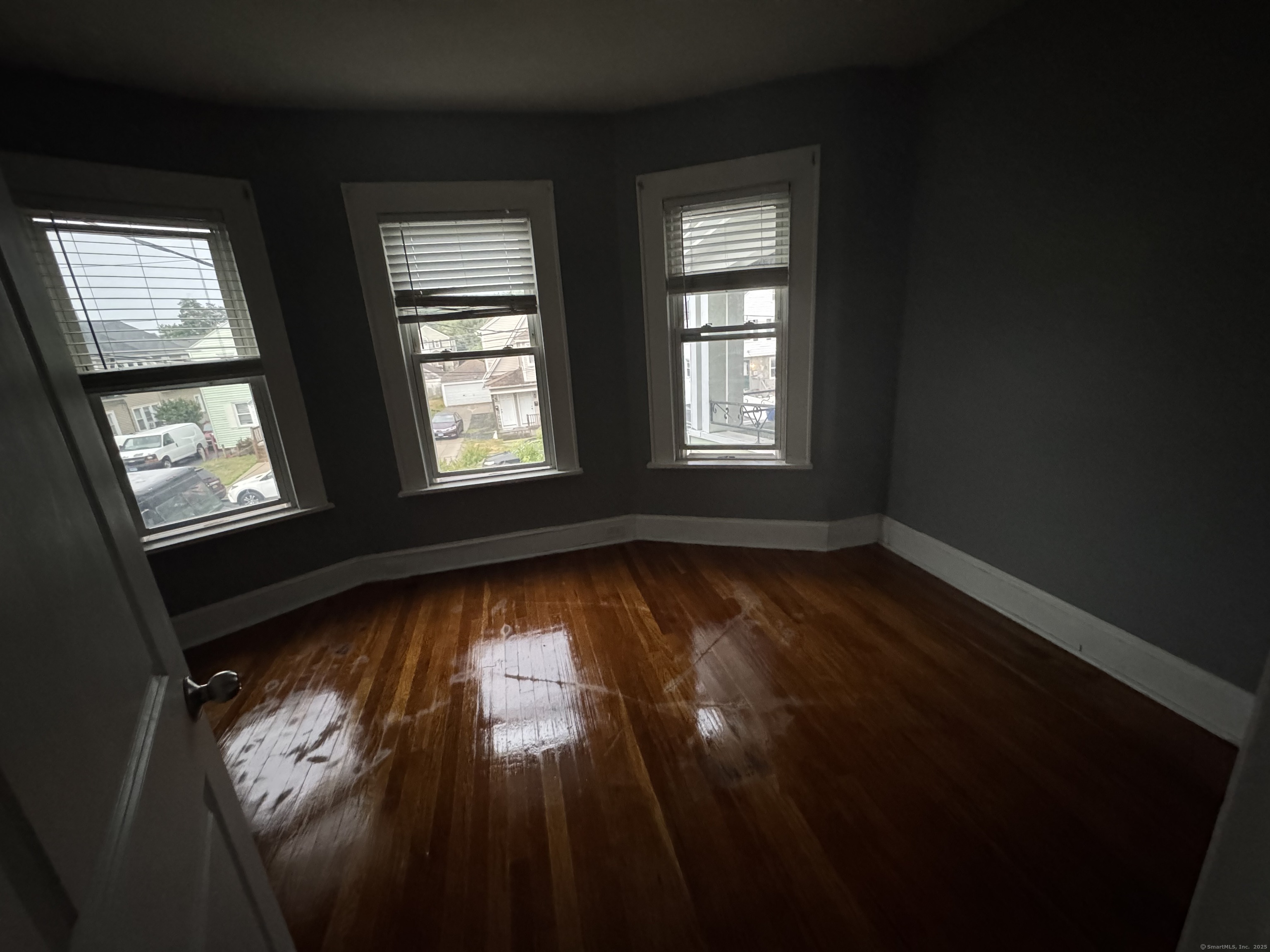 65 Palm Street Bridgeport, CT 06610 - Photo 11 of 13 a view of an empty room and window