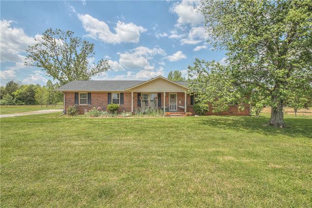 4736 Midland Road Christiana, TN 37037 - Photo 1 of 19 Beautiful brick home on five acres.