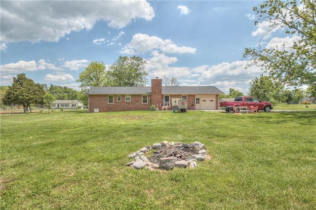 4736 Midland Road Christiana, TN 37037 - Photo 2 of 19 Wondeful back yard with tons of possibilities. Nice patio with beautiful views over your property.