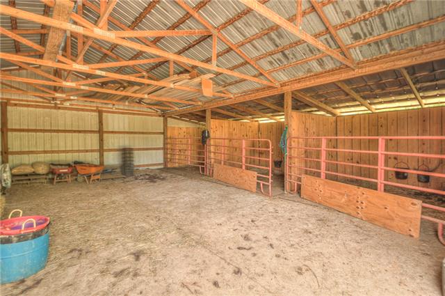 4736 Midland Road Christiana, TN 37037 - Photo 15 of 19 The possibilities for this barn/building are endless. It is Approximately 37x40 with water ran to it and electricity. If your not into horses, it has a concrete floor for a work shop or plenty of room for storage and your toys
