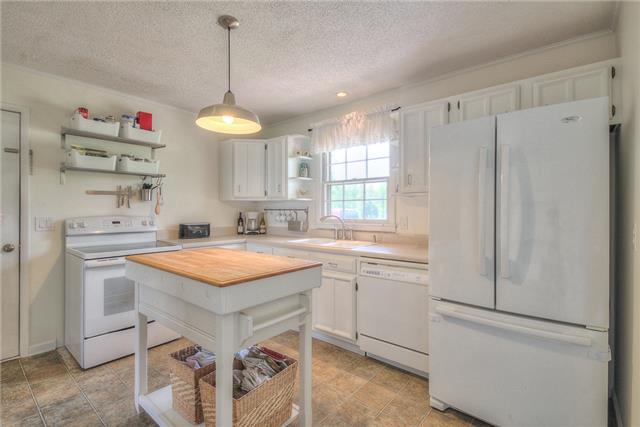4736 Midland Road Christiana, TN 37037 - Photo 6 of 19 This country kitchen fits this property perfectly. Beautiful views over your property from the sink.