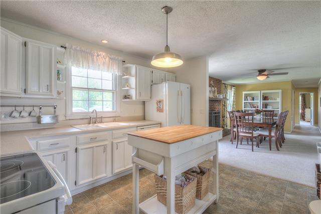 4736 Midland Road Christiana, TN 37037 - Photo 19 of 19 Open floor plan allows easy access to the kitchen area from anywhere in the house. New countertops in kitchen