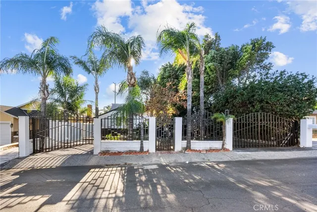 front view of a house with a garden