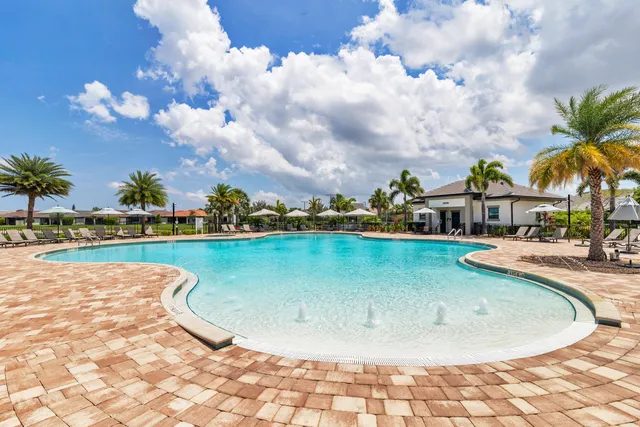 a view of swimming pool from a lake view