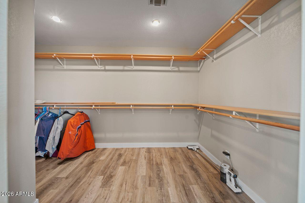 51718 West Donald Road Aguila, AZ 85320 - Photo 15 of 59 a view of walk in closet with clothes and shoes