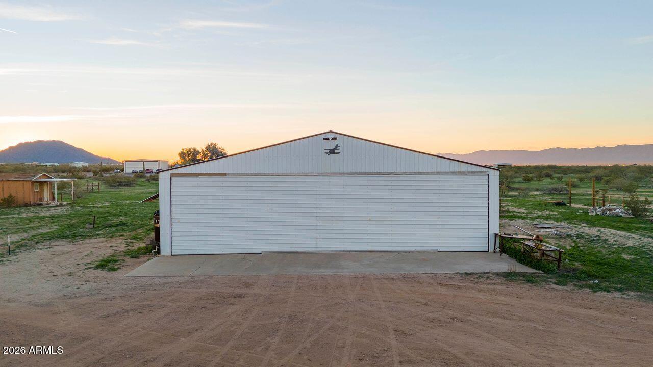 51718 West Donald Road Aguila, AZ 85320 - Photo 23 of 59 a view of wooden house and a yard