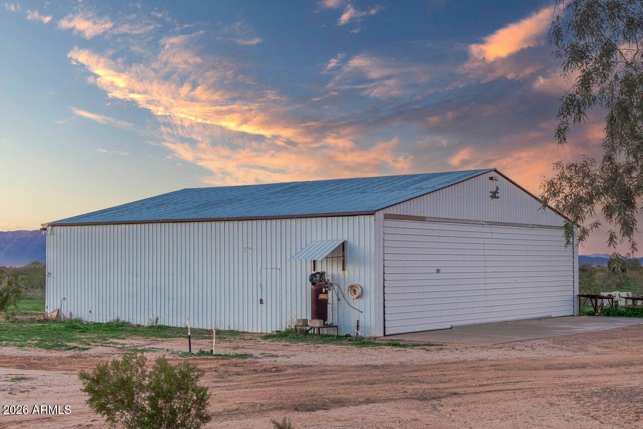 51718 West Donald Road Aguila, AZ 85320 - Photo 25 of 59 a view of a house with backyard