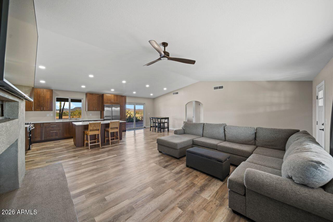 51718 West Donald Road Aguila, AZ 85320 - Photo 6 of 59 a living room with furniture and kitchen view