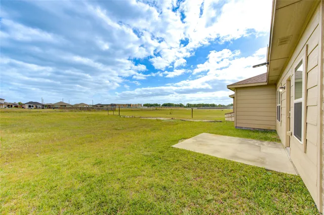 a view of an ocean with a big yard