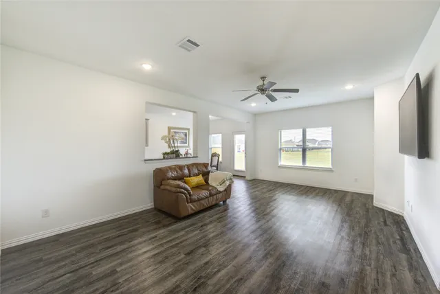 a view of livingroom with furniture and wooden floor