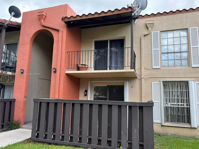 a view of a brick house with a window