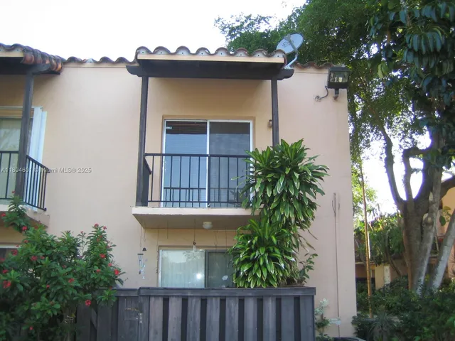 a sign that is on the wall of the building