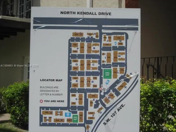 a view of front door with wooden floor