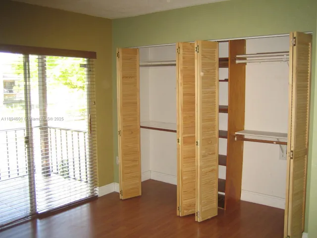 a view of a swimming pool with a garden