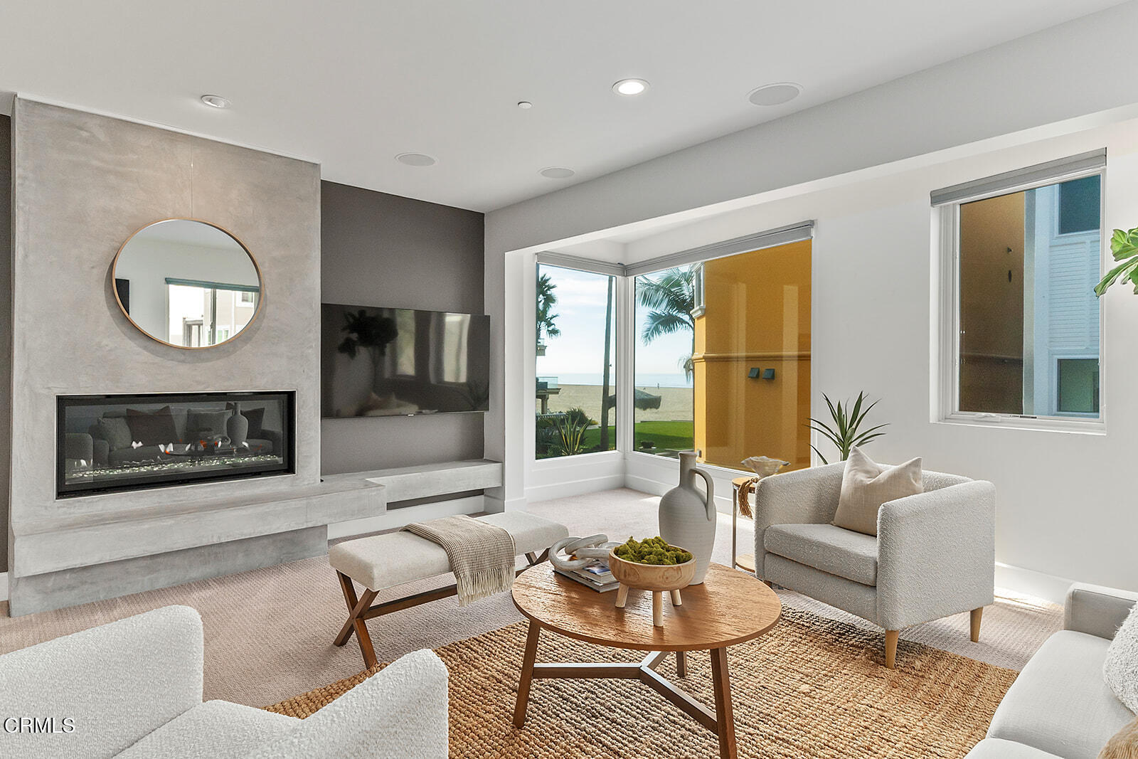 92 B Surfside Avenue Surfside, CA 90743 - Photo 11 of 47 a living room with furniture and a fireplace