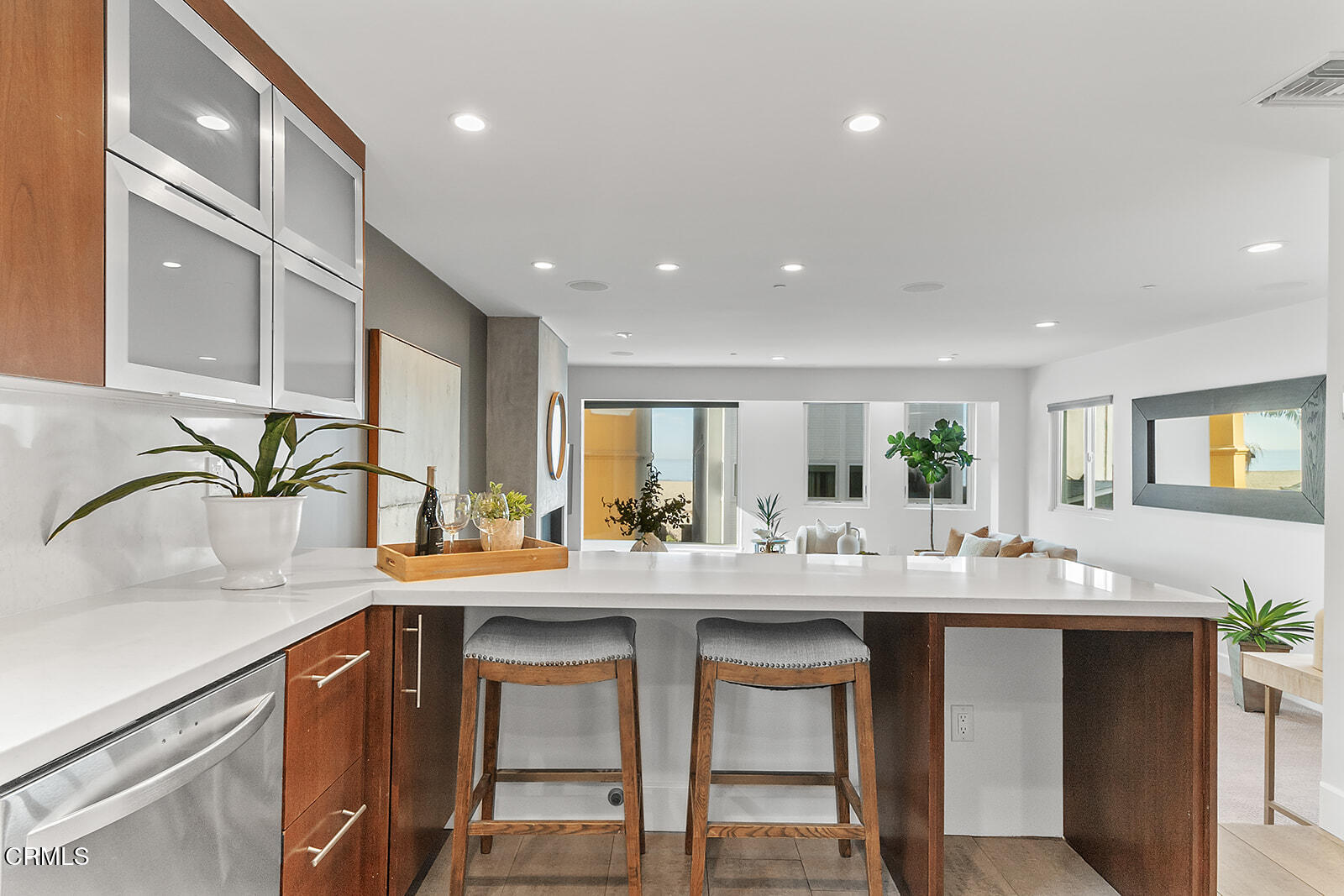 92 B Surfside Avenue Surfside, CA 90743 - Photo 17 of 47 a kitchen with a sink and cabinets