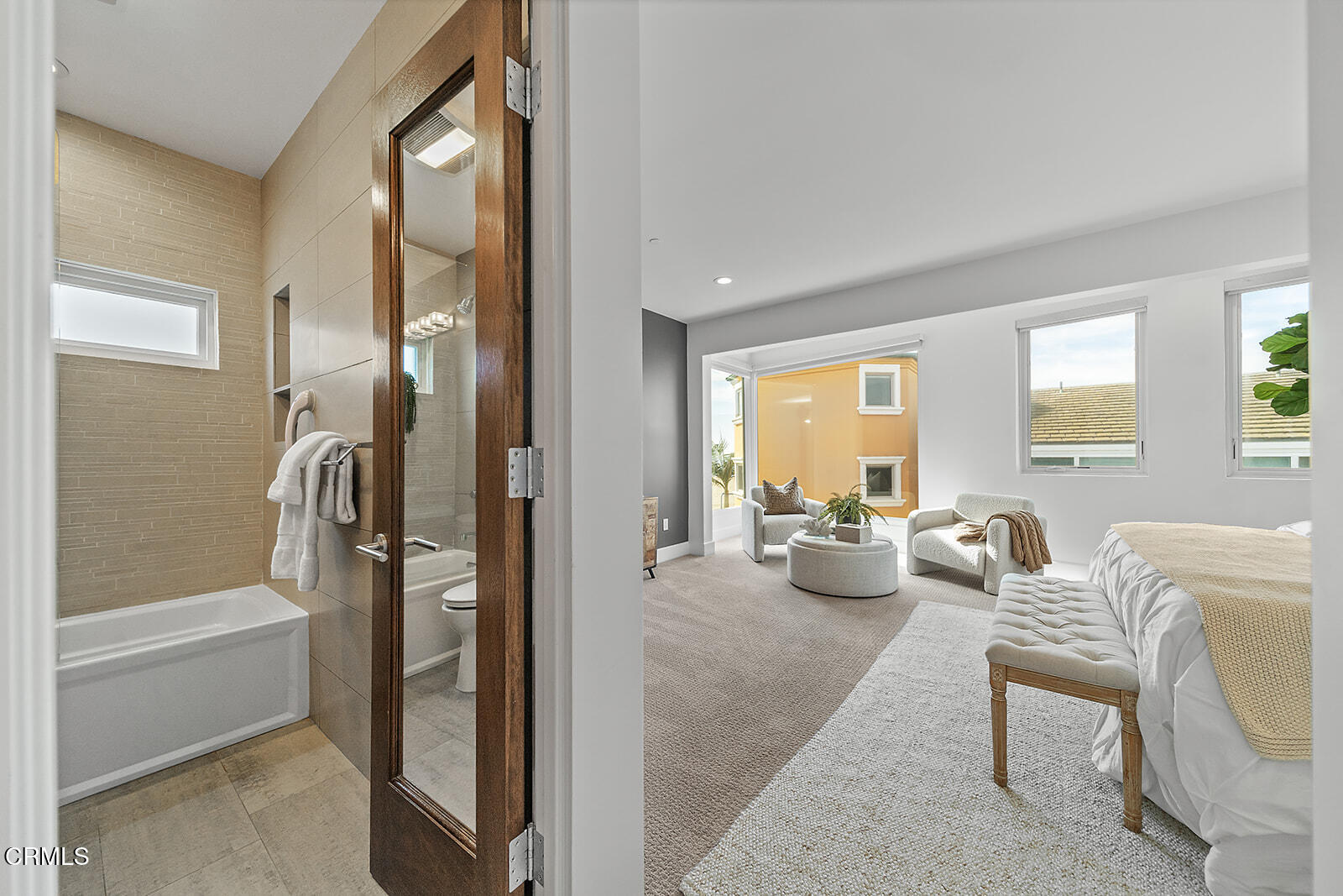 92 B Surfside Avenue Surfside, CA 90743 - Photo 20 of 47 a living room with furniture and a floor to ceiling window