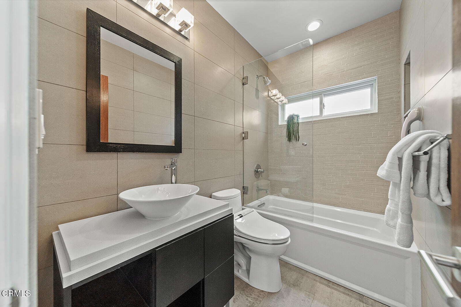 92 B Surfside Avenue Surfside, CA 90743 - Photo 24 of 47 a bathroom with a sink a toilet and shower