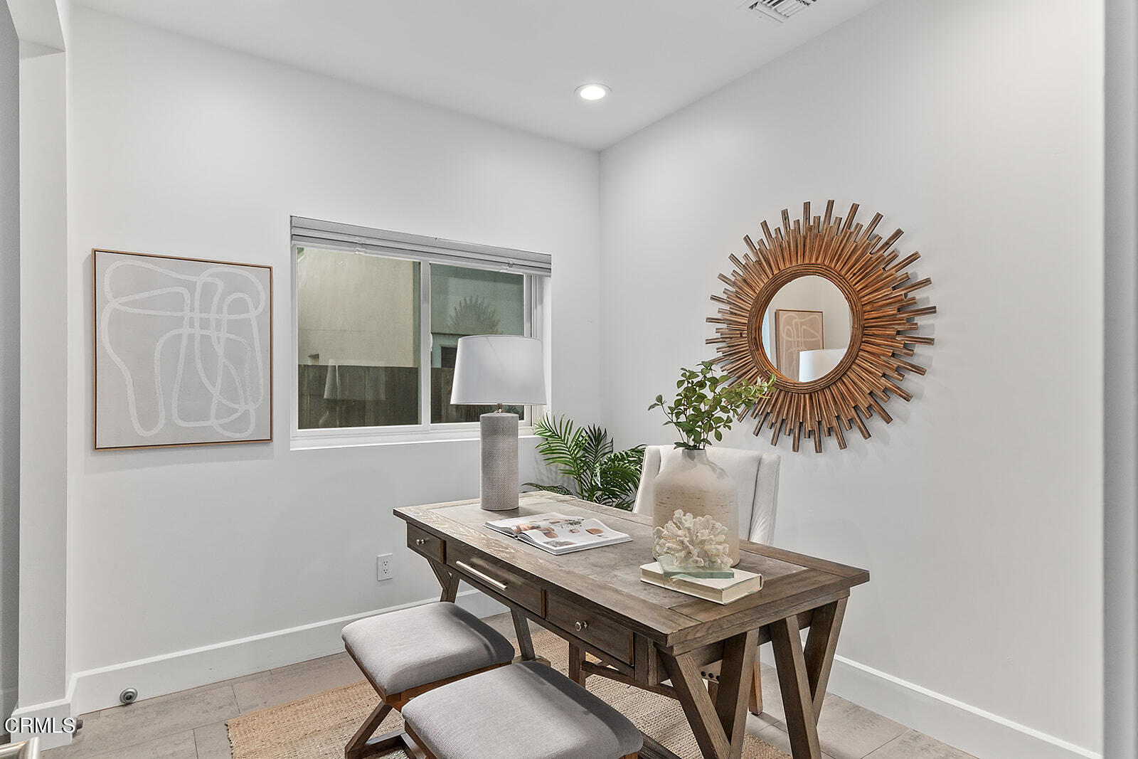 92 B Surfside Avenue Surfside, CA 90743 - Photo 28 of 47 a view of a dining room with furniture and wooden floor