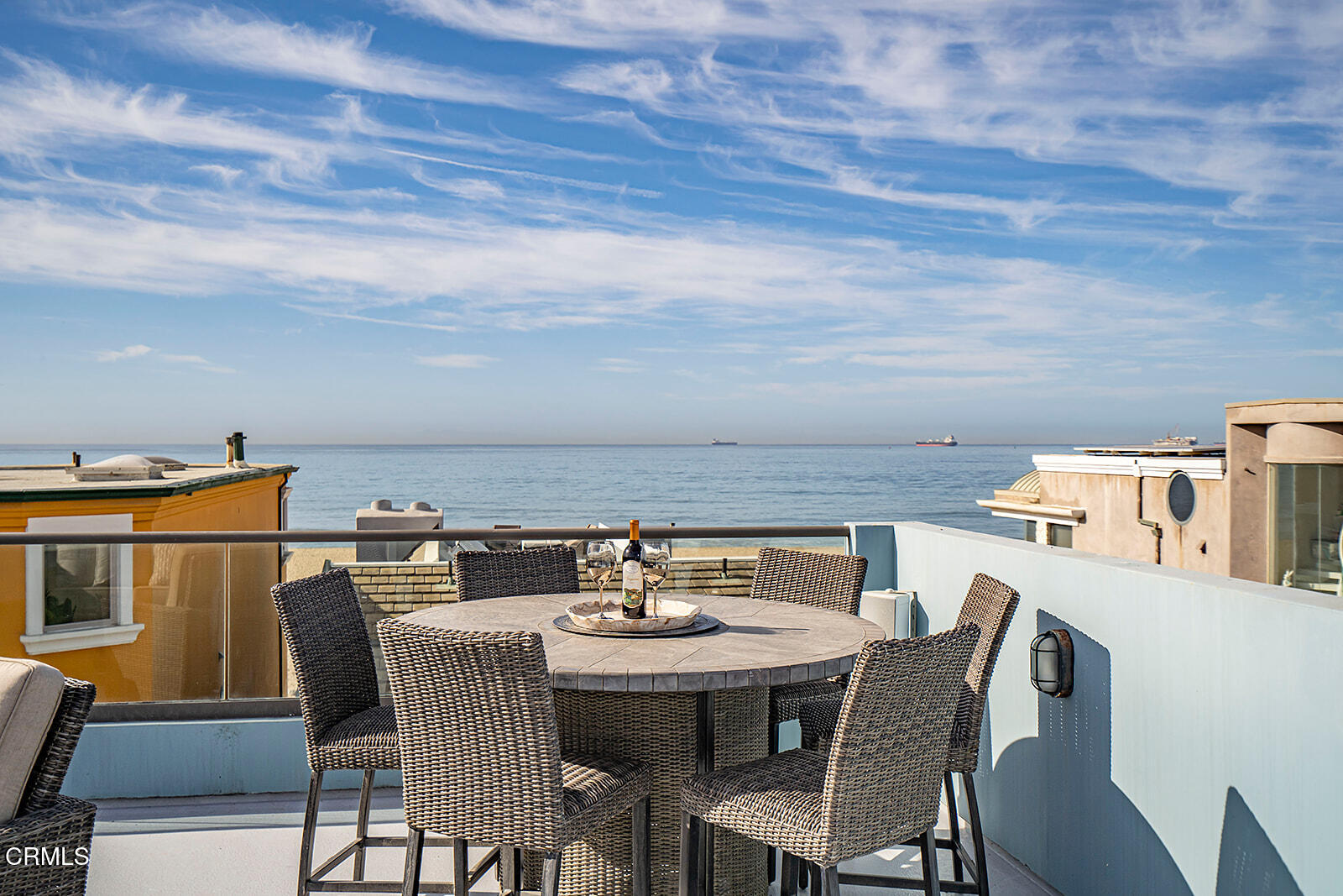 92 B Surfside Avenue Surfside, CA 90743 - Photo 33 of 47 a view of a dining room with furniture and wooden floor