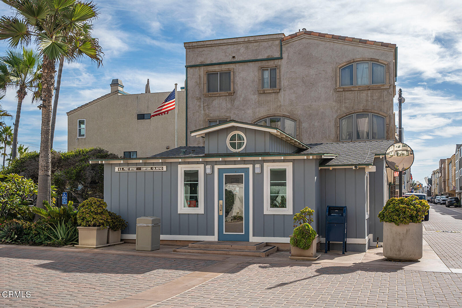 92 B Surfside Avenue Surfside, CA 90743 - Photo 47 of 47 front view of a brick house with potted plants