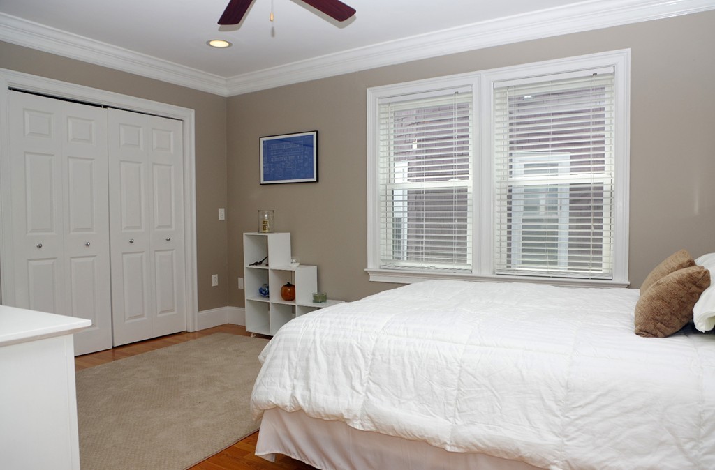 39 Juliette Street, Unit 3 Boston, MA 02122 - Photo 10 of 20 a bedroom with a bed and a large window